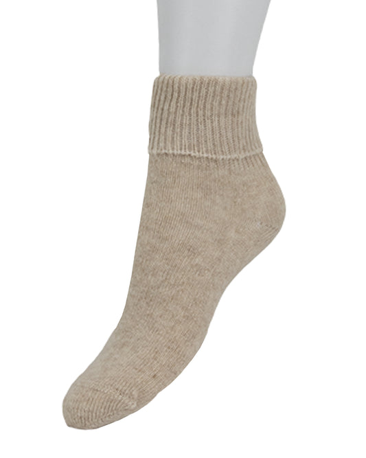 Beige knitted sock on a white background