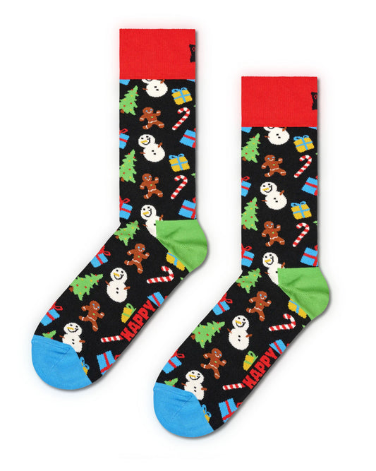 Happy Socks Bring It On Sock - Cotton crew length ankle socks with a multicoloured Christmas themed pattern of ginger bread men, candy canes, snowmen, presents, Xmas trees on a black background with light blue toe, green heel and red cuff.