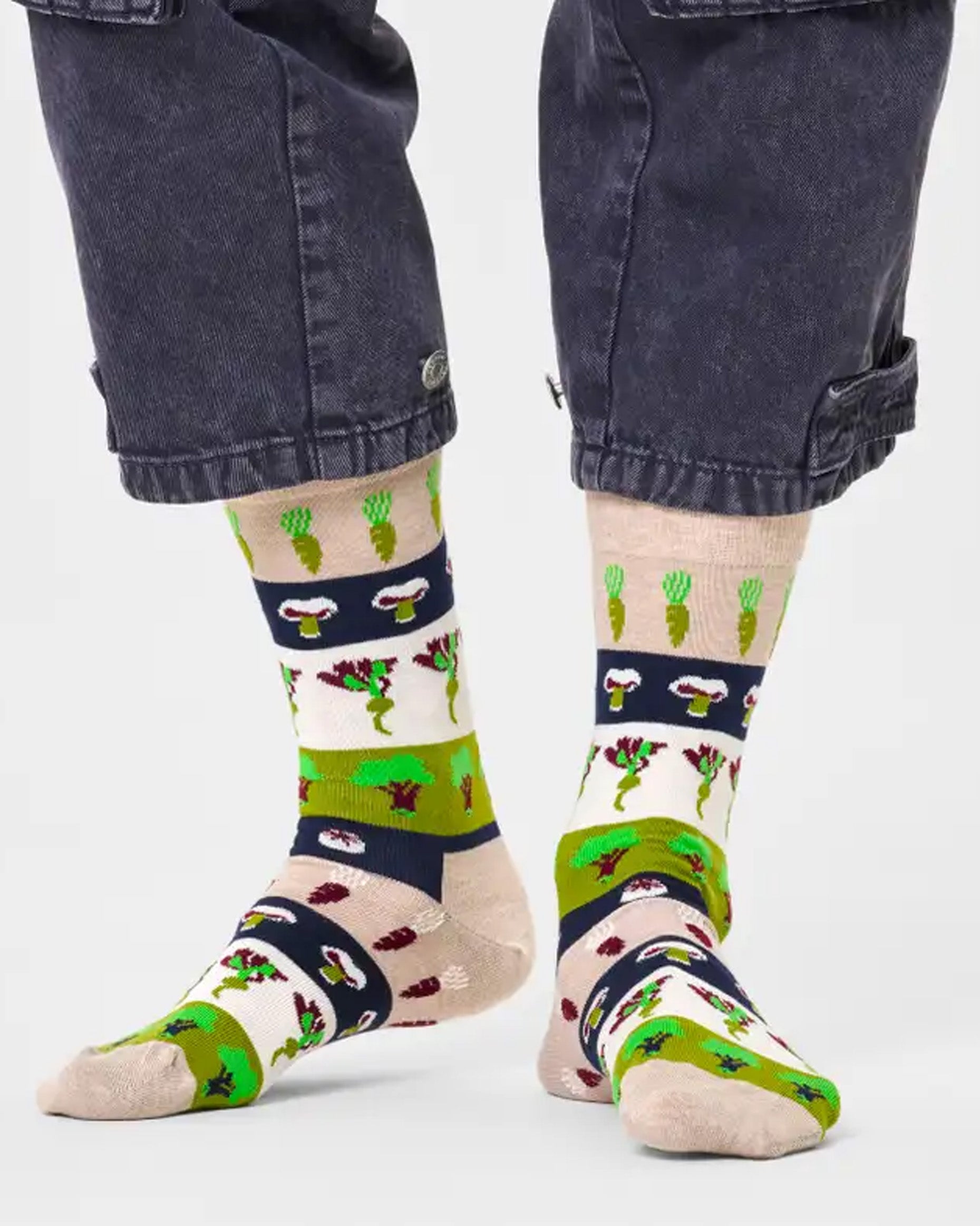 Happy Socks Veggie Sock - Beige oat coloured crew cotton socks with a stripe pattern of assorted vegetables including carrots, broccoli, mushrooms, turnips etc. in shades of green and wine.  Perfect gift for vegans and vegetarians.