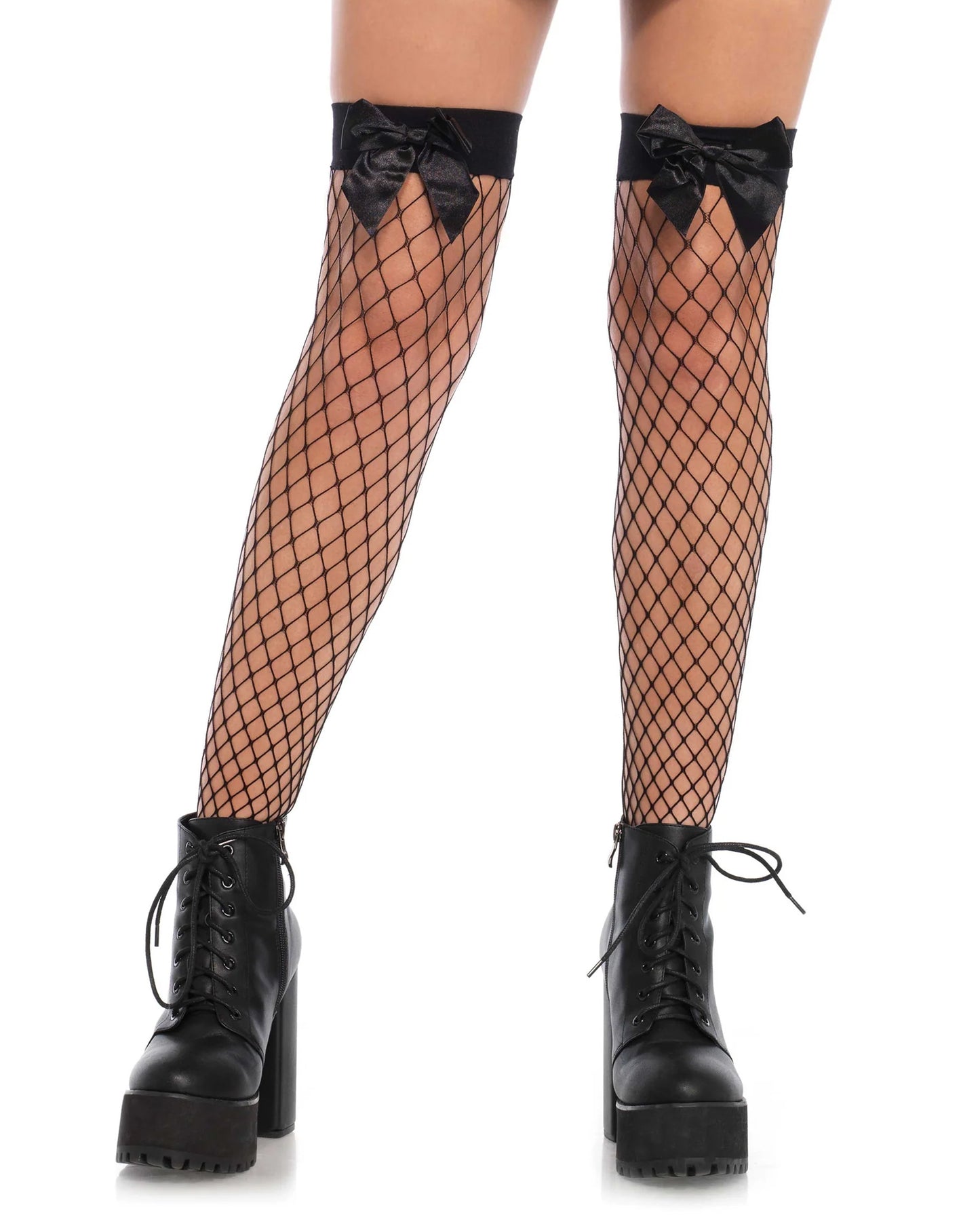 Leg Avenue Fishnet Bow Thigh Highs - Black wide fence fishnet thigh-high socks with wide elasticated cuff and satin bows. Worn with black laced boots.