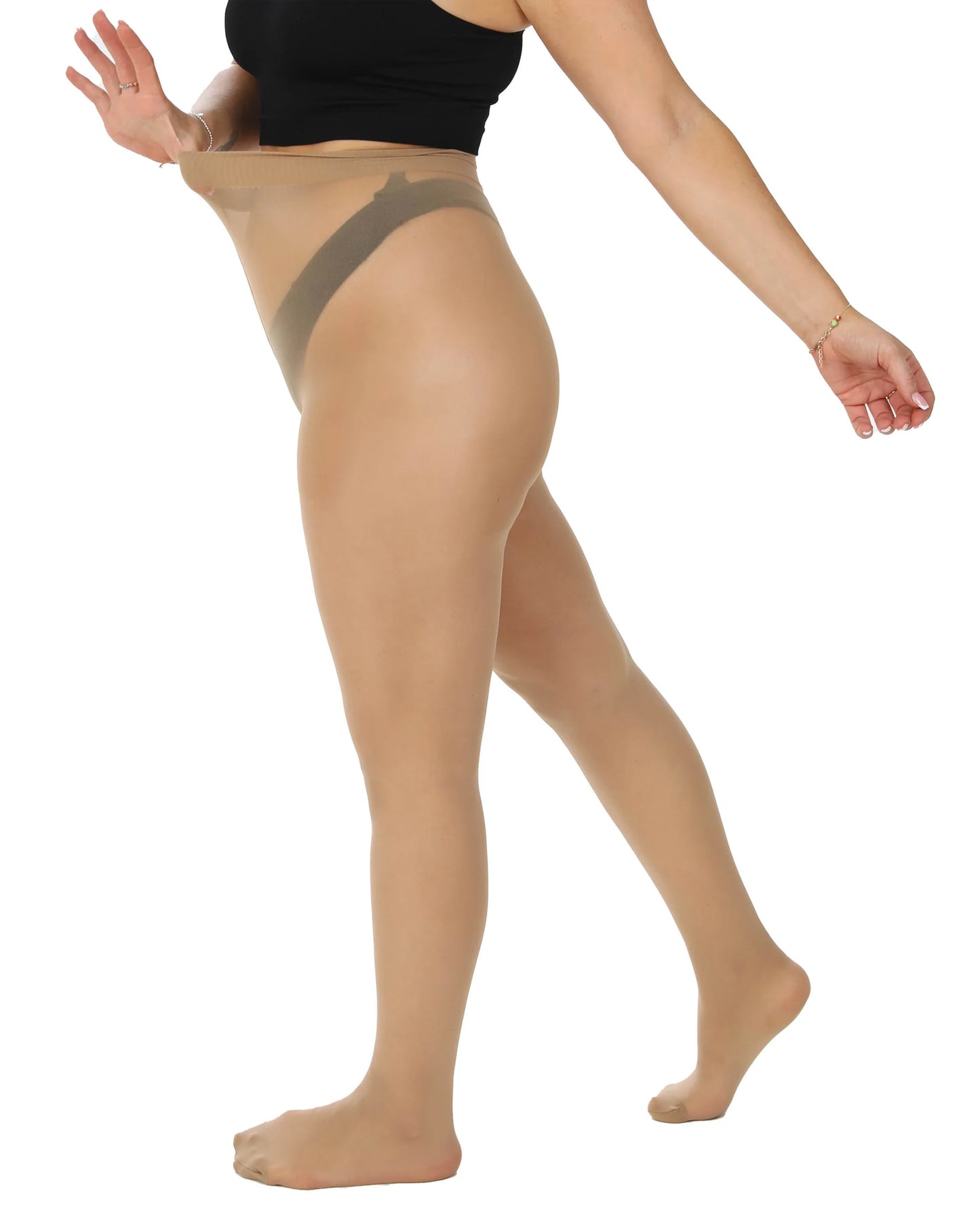 Pamela Mann Sheer Curvy Tights - Sheer nude extra stretch tights that are designed for the curvy fuller plus size figure. They are high rise with a deep waist band, they have a wider thigh fit, flat seams and have a light leg support to enhance overall comfort, side view.