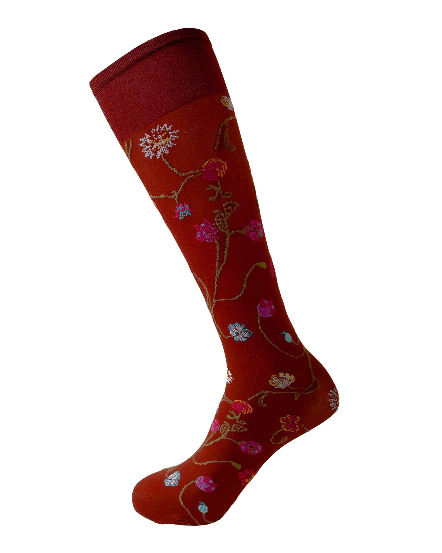 Maroon red sock with colourful floral patterns on a white background