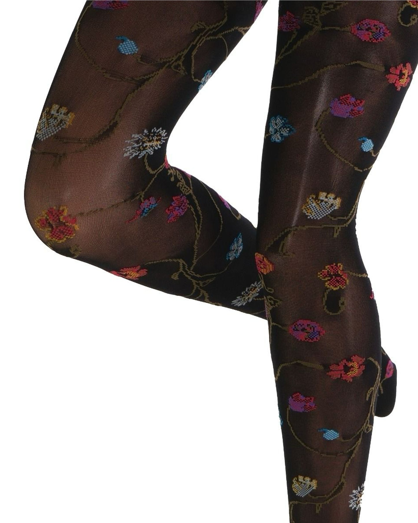 Black coloured tights with a colourful floral patterned (close up detail) on a white background