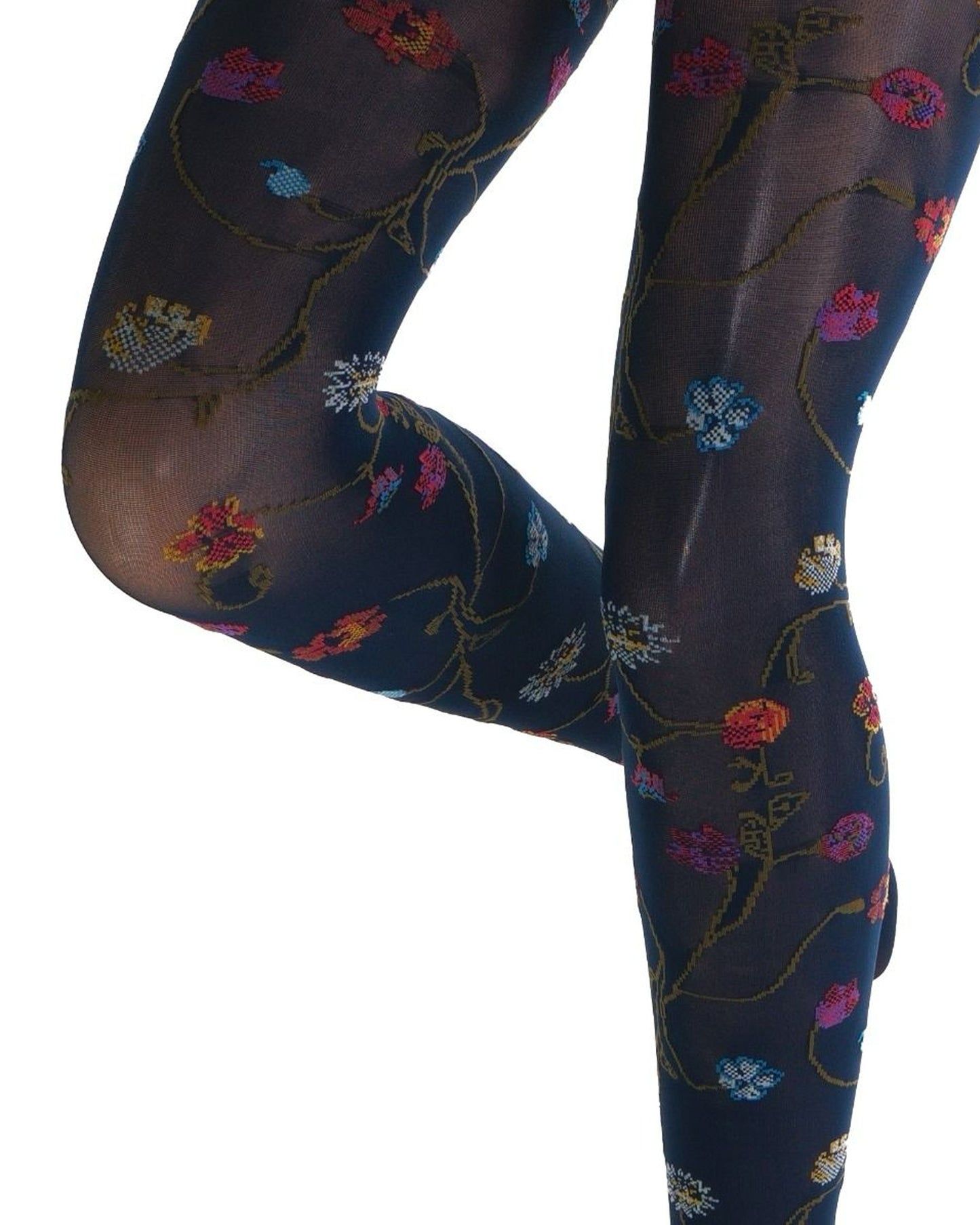 Navy blue coloured tights with a colourful floral patterned (close up detail) on a white background