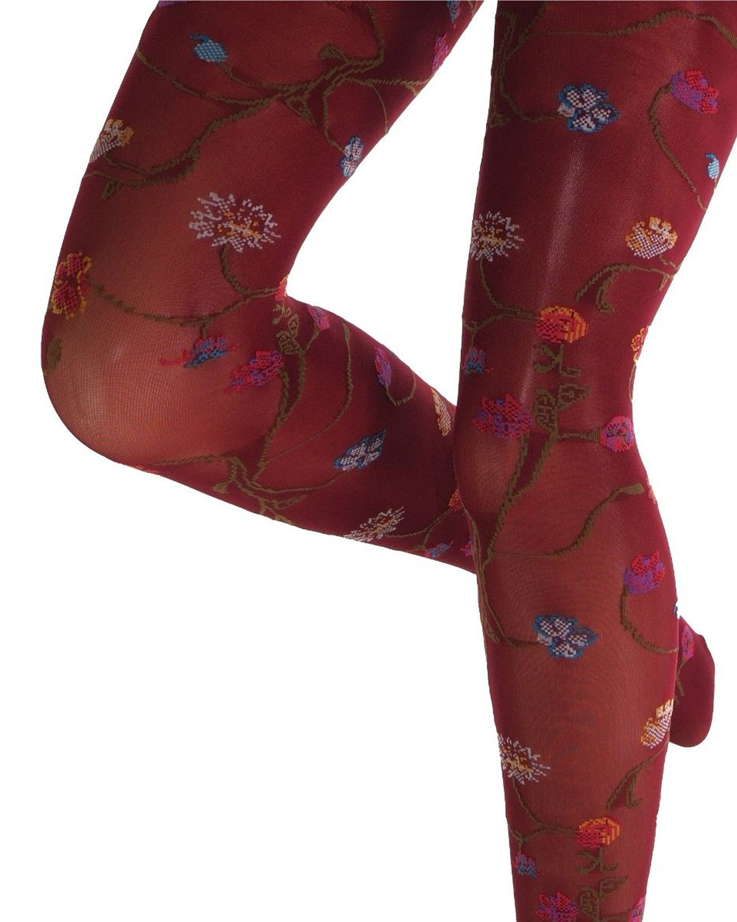 Maroon coloured tights with a colourful floral patterned (close up detail) on a white background