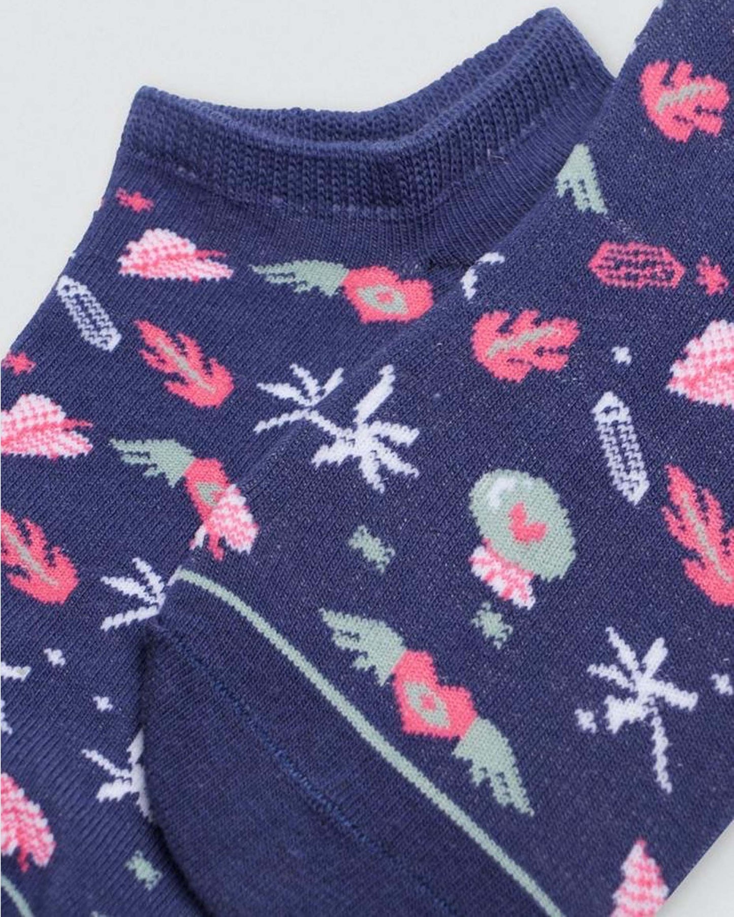 Ysabel Mora Flying Hearts Sock - Navy low ankle socks with flying hearts, leaves, flowers & crystals in pink, sage green and white. Close up detail.