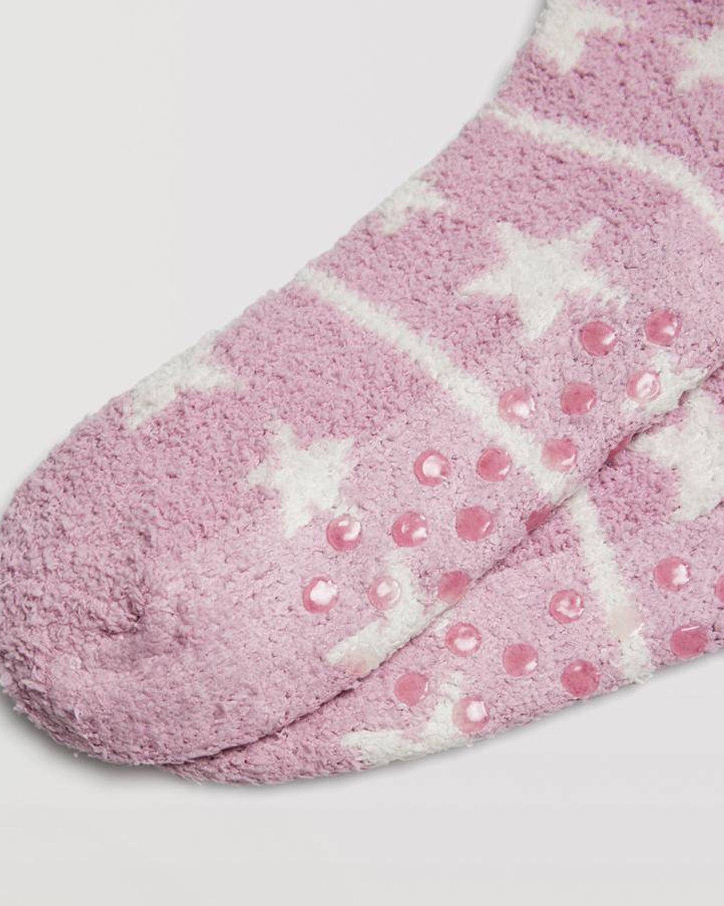 Ysabel Mora 12891 Star Slipper Socks - Warm and fluffy light pink slipper socks with a cream stars and stripes horizontal pattern, dotted anti-slip grippers on the sole and anti-pressure cuff and anti-pressure cuff.