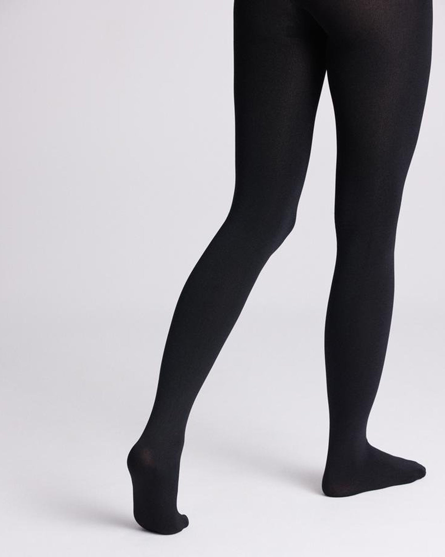 Ysabel Mora - 16841 Thermal Fleece Lined Tights in black. Back view.