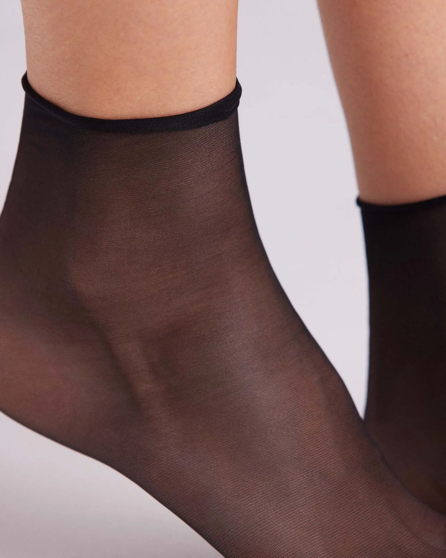 Ysabel Mora 18123 No Cuff Socks - Sheer black ankle socks with a soft roll top, perfect for those that suffer from swollen ankles as there is no elasticated cuff. Close up detail.