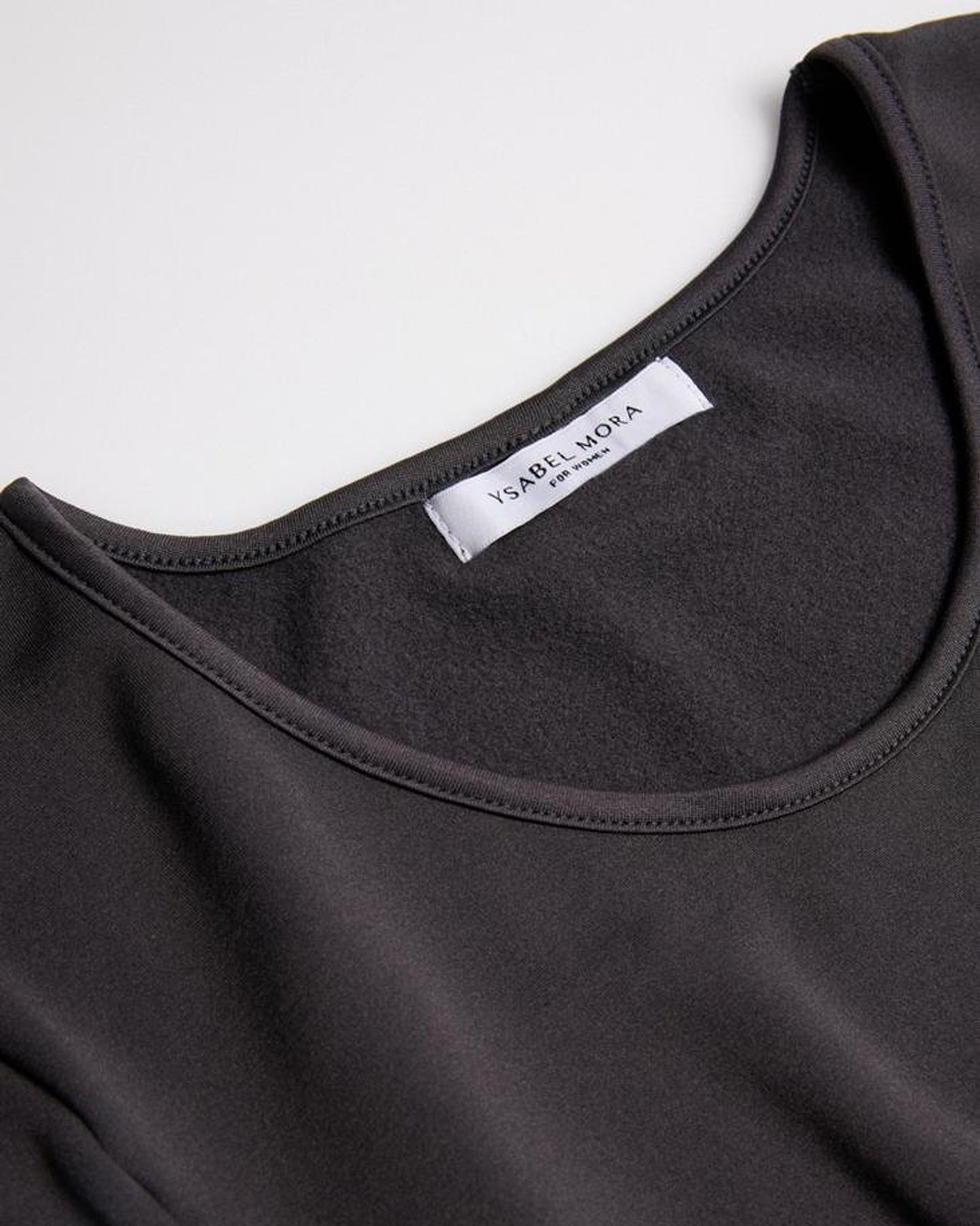 Ysabel Mora - 70002 Black Thermal Fleece Lined Crew Neck Top, worn with light grey leggings.