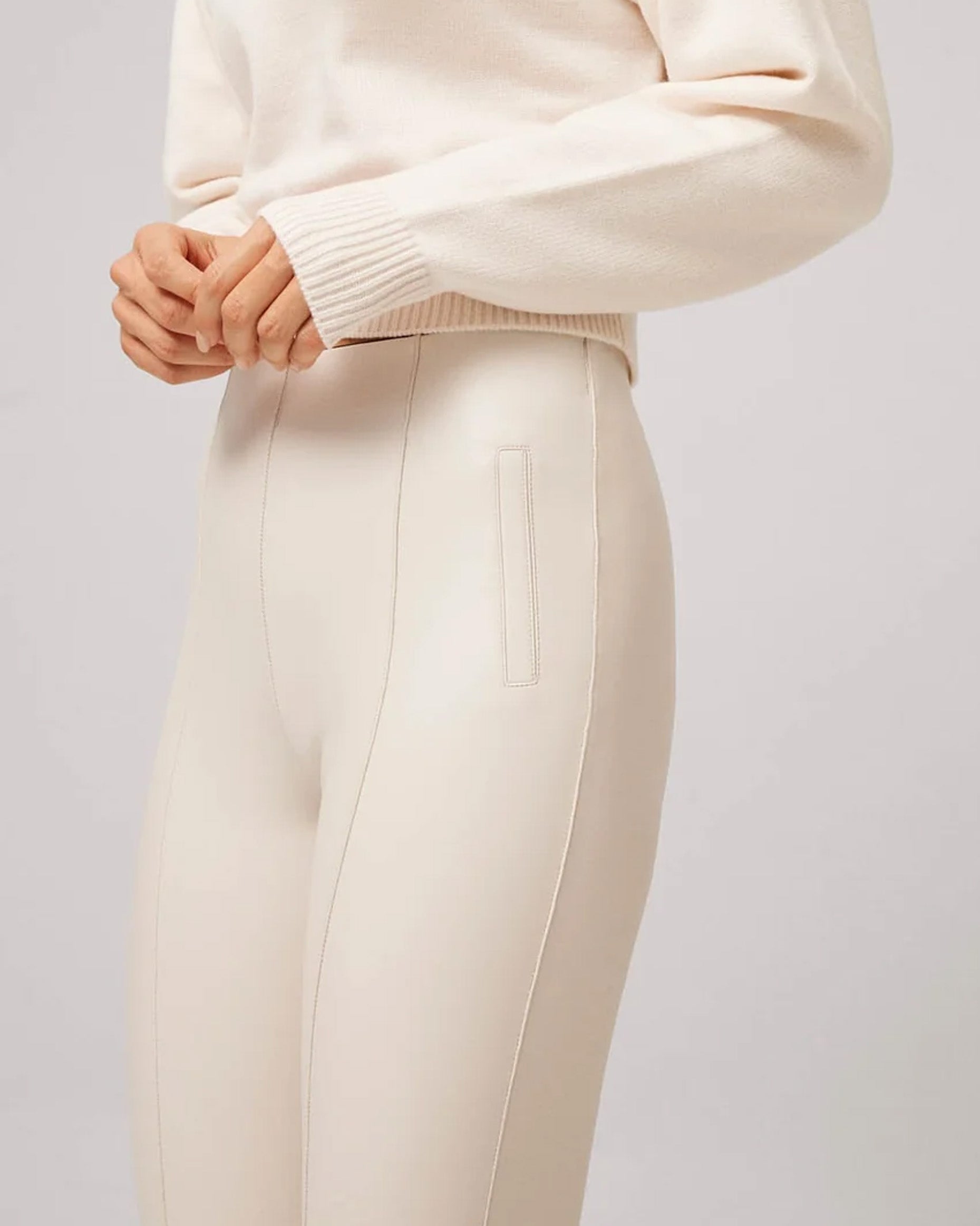 Ysabel Mora 70295 Faux Leather Slit Leggings - Tight fit faux leather thermal cream coloured leggings with a warm plush fleece lining, faux side pocket stitching, centre seam down the front.