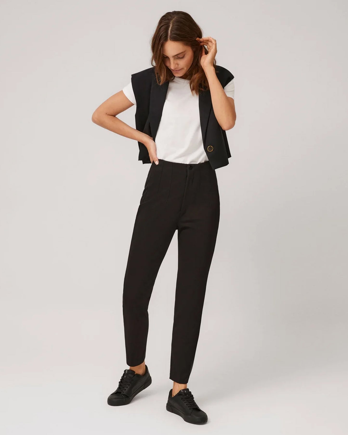 Ysabel Mora 70403 High Waist Trousers - Black suit style high waisted pants with pleated darts, invisible front zipper and button, worn with white t-shirt, waist coat and black sneakers