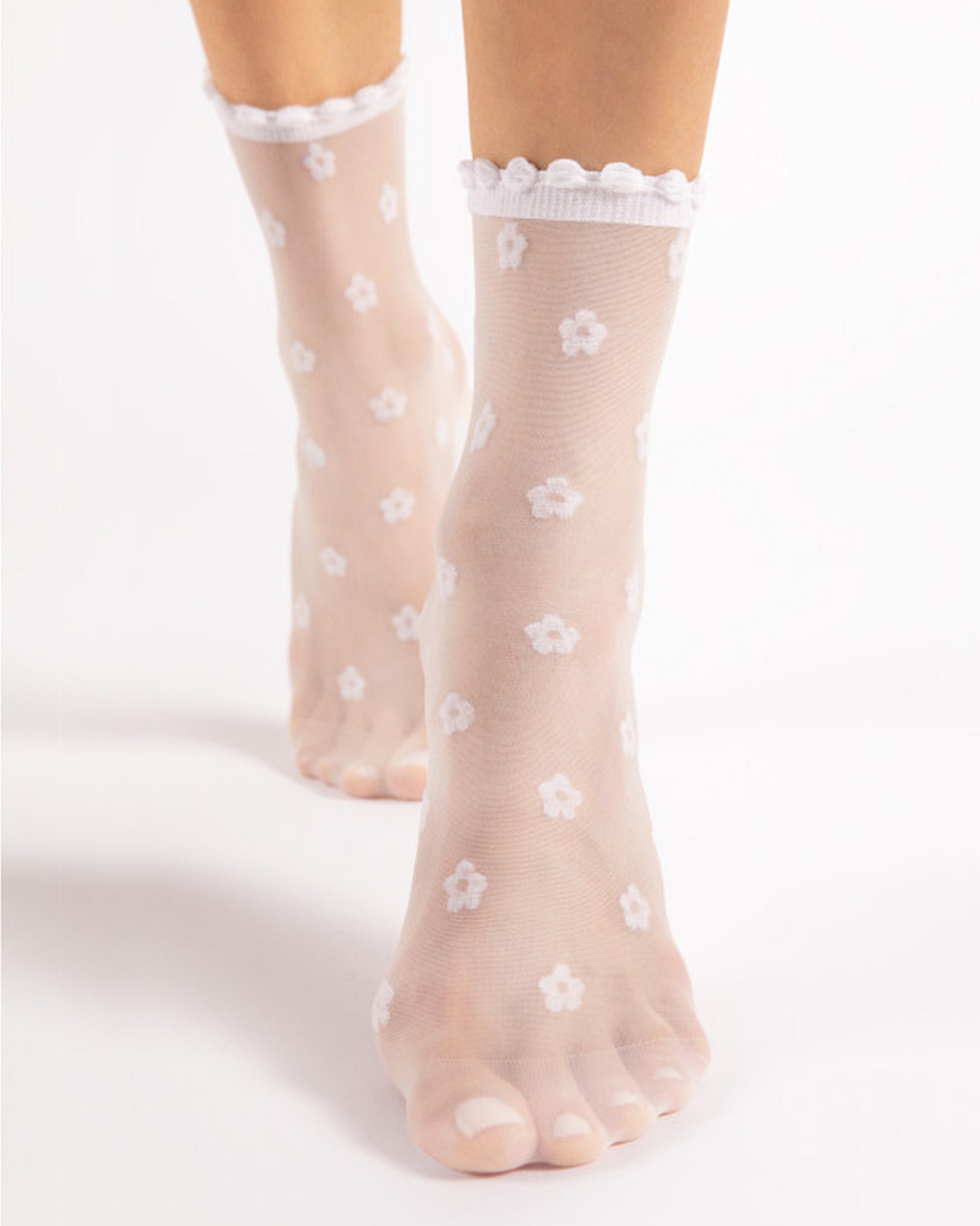 Fiore April Socks - Sheer white fashion ankle socks with an all over daisy plower pattern, frilly scalloped cuff and sheer reinforced toe.