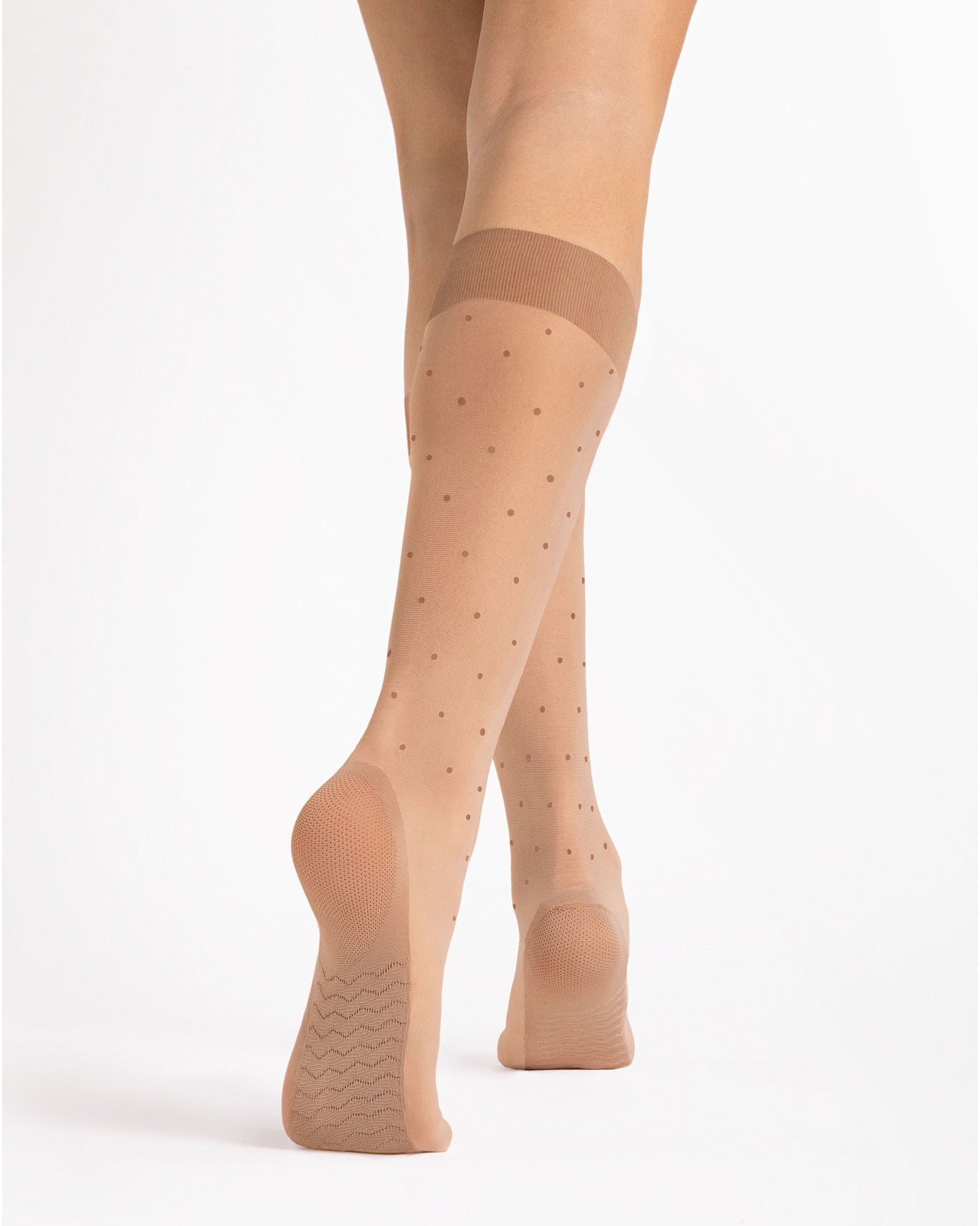 Fiore Massage Dots 20 Den - Sheer nude/tan classic polka dot patterned knee-high socks with a built in reinforced shoe liner sock and deep comfort cuff. Back view