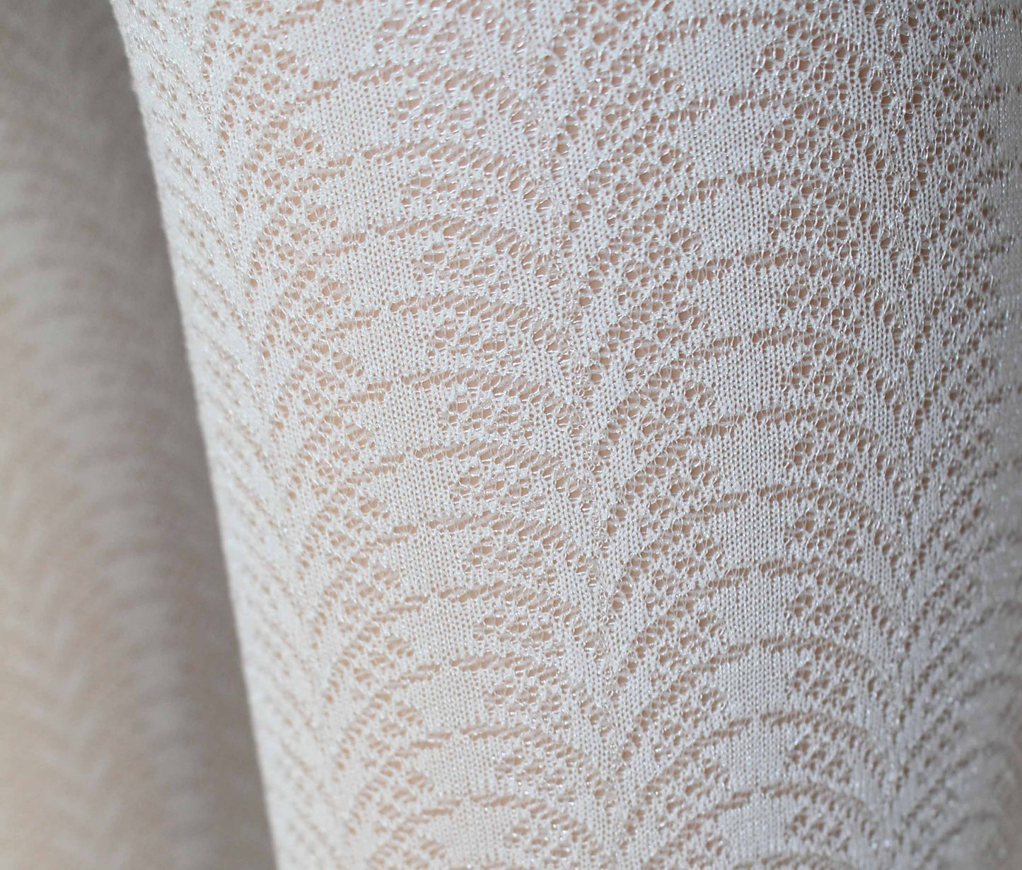 Omsa Serenella Delice Children's tights - Cream Semi opaque Kid's fashion tights with a woven circular linear lace style pattern.