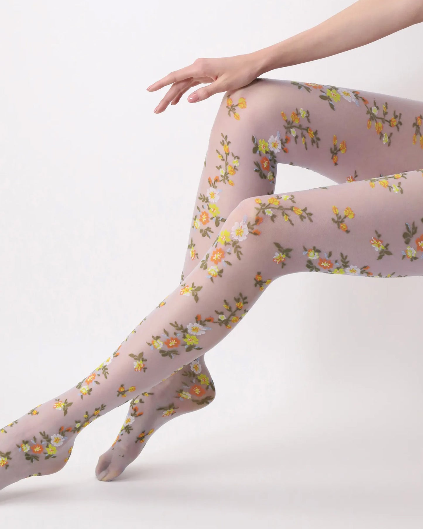 Oroblù Embroidery Collant - Sheer pale blue fashion tights with a multicoloured woven floral pattern of orange, yellow, white and green.