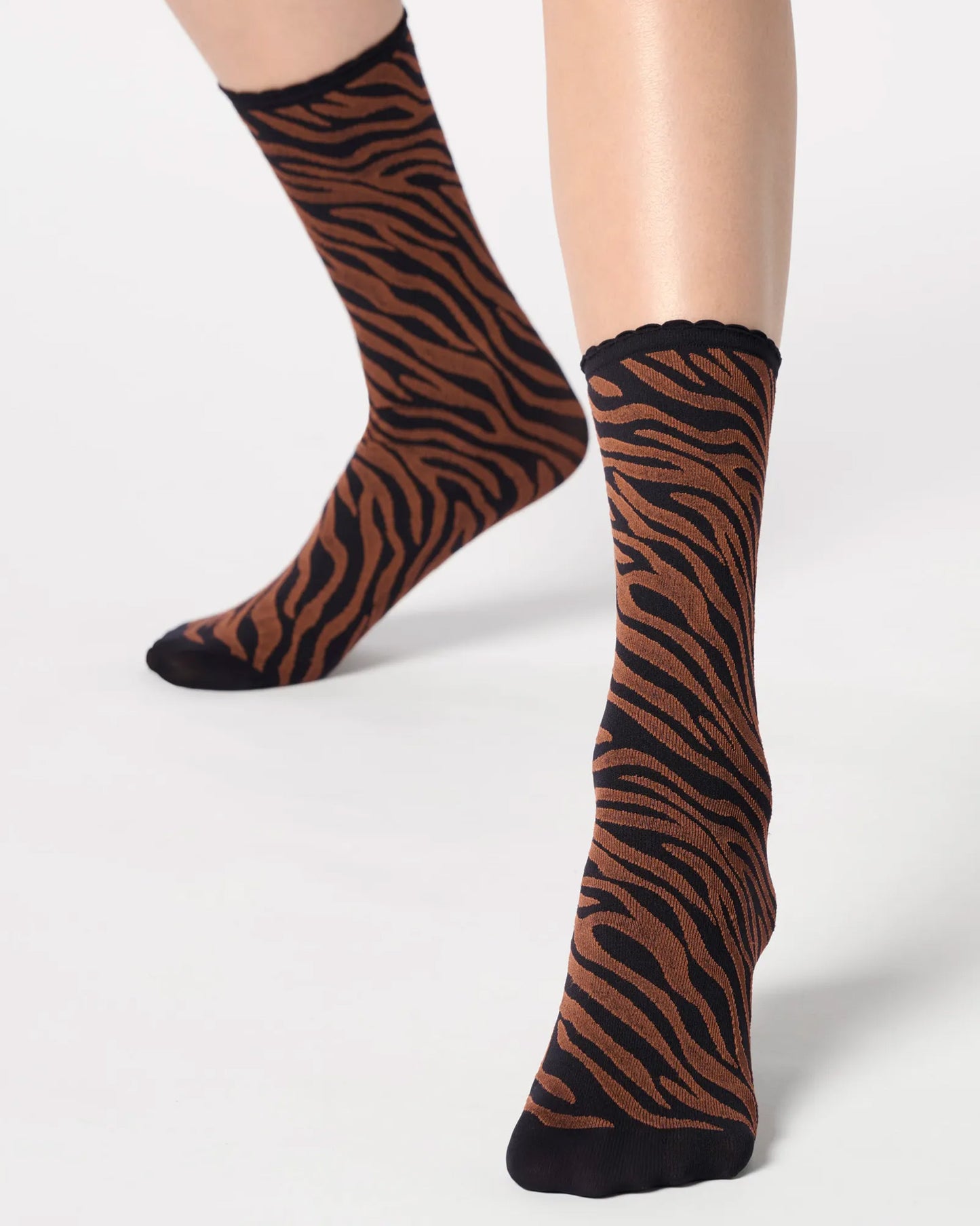 Black and rusty brown zebra print ankle socks.