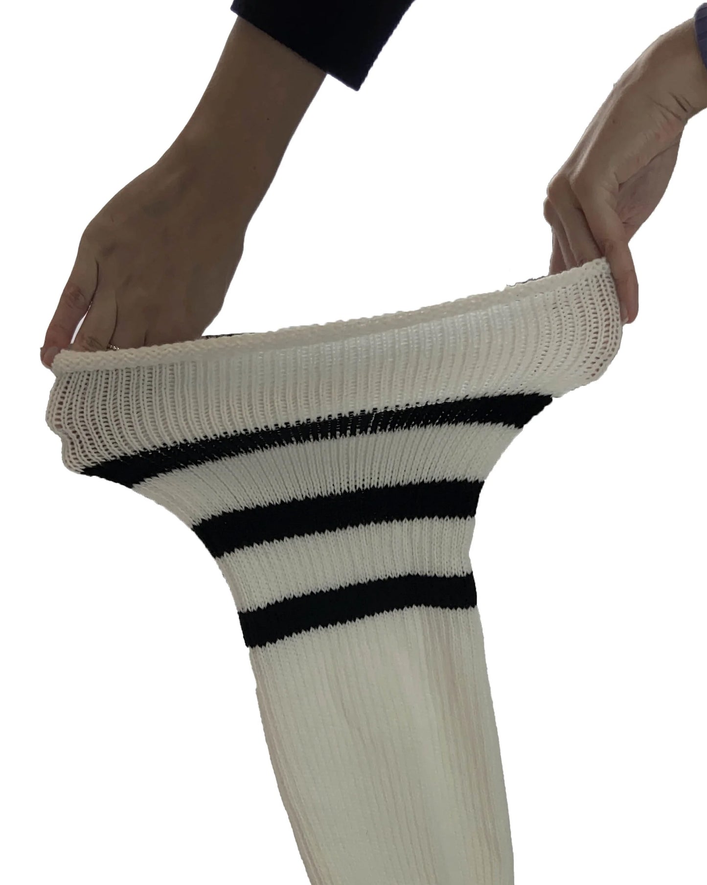Thick, super-stretchy white knitted thigh-high socks featuring a triple black sports-style striped cuff