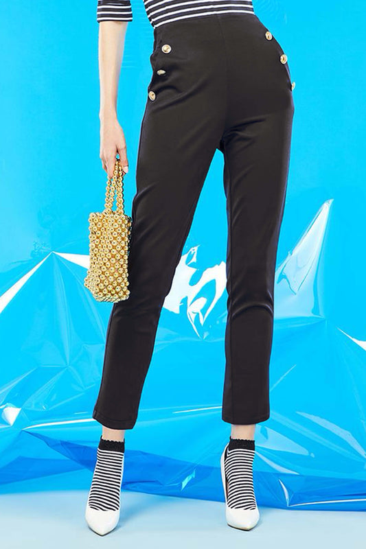 SiSi Brigitte Trouser - High waisted black trouser leggings with elasticated waist band on the back, side pockets and big gold button details along the pockets.