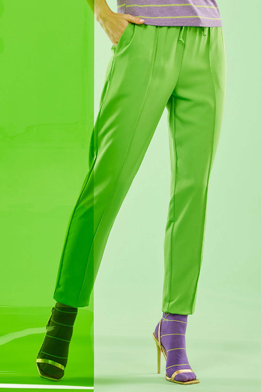 SiSi Swing Trouser - Bright lime green colour jogger style trousers with drawstring waist, side pockets and raised centre seam down the front of the leg.