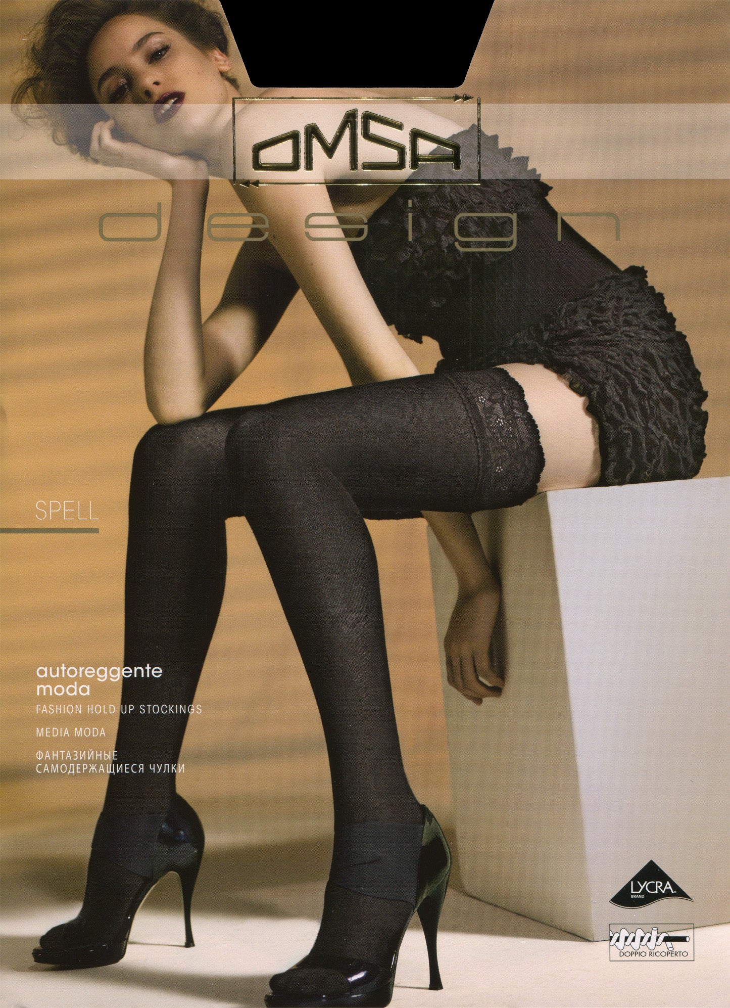 Omsa Spell Autoreggente - Ultra opaque soft knitted hold-ups with and luxury lace top. Available in black and grey.