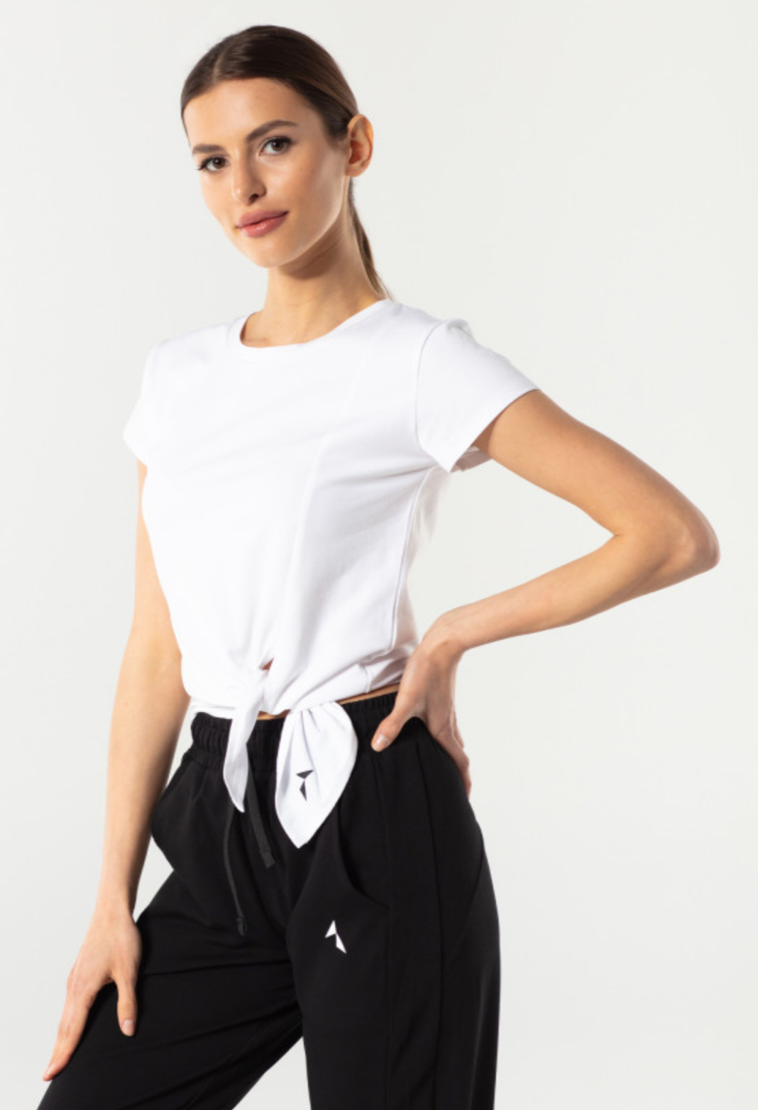 Carpatree Side T-Shirt - Short white sports t-shirt with a side tie knot. Made of soft and cool polyester fabric.