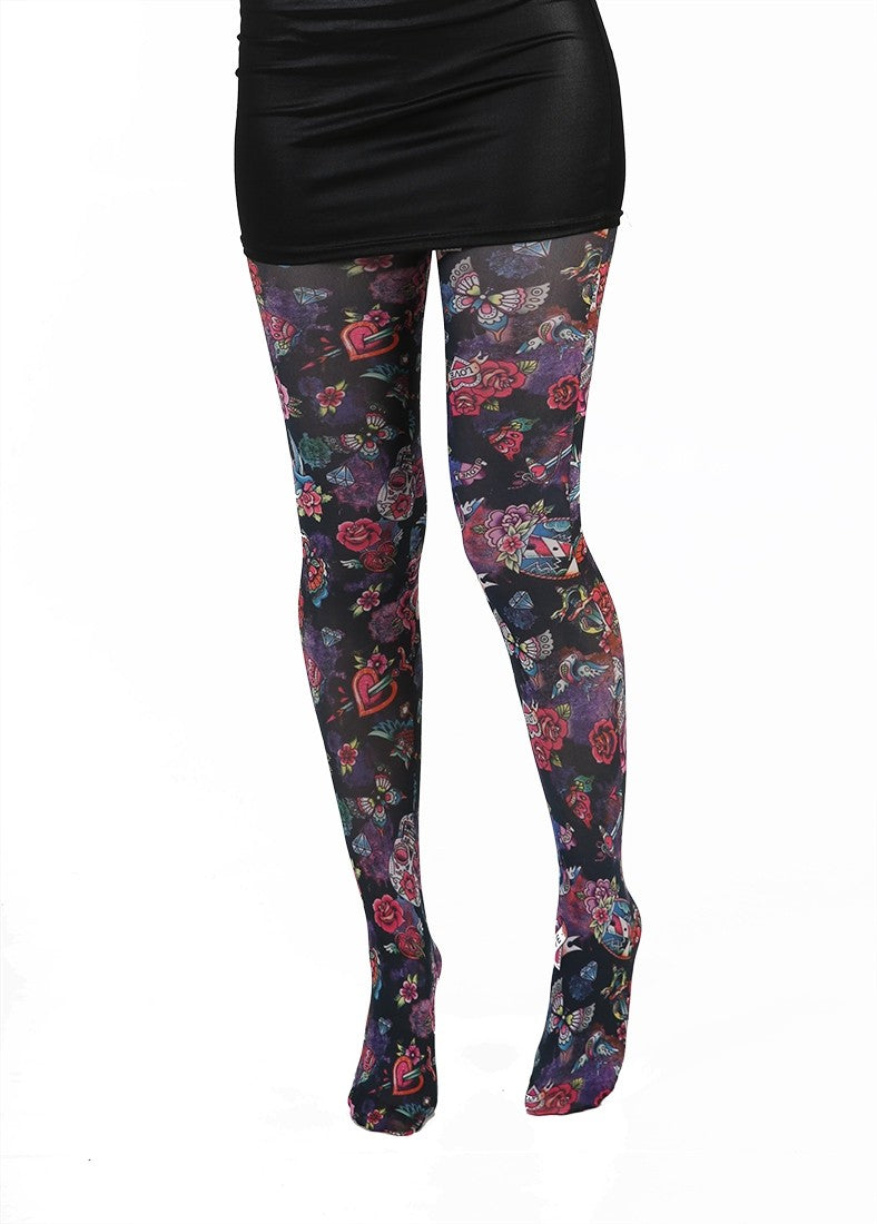 Pamela Mann Sugar Skulls Tights - White opaque tights with an all over multicoloured day of the dead style tattoo print of skulls, roses, hearts, daggers, butterflies, owls, jewels etc. on a black background, perfect for Halloween.