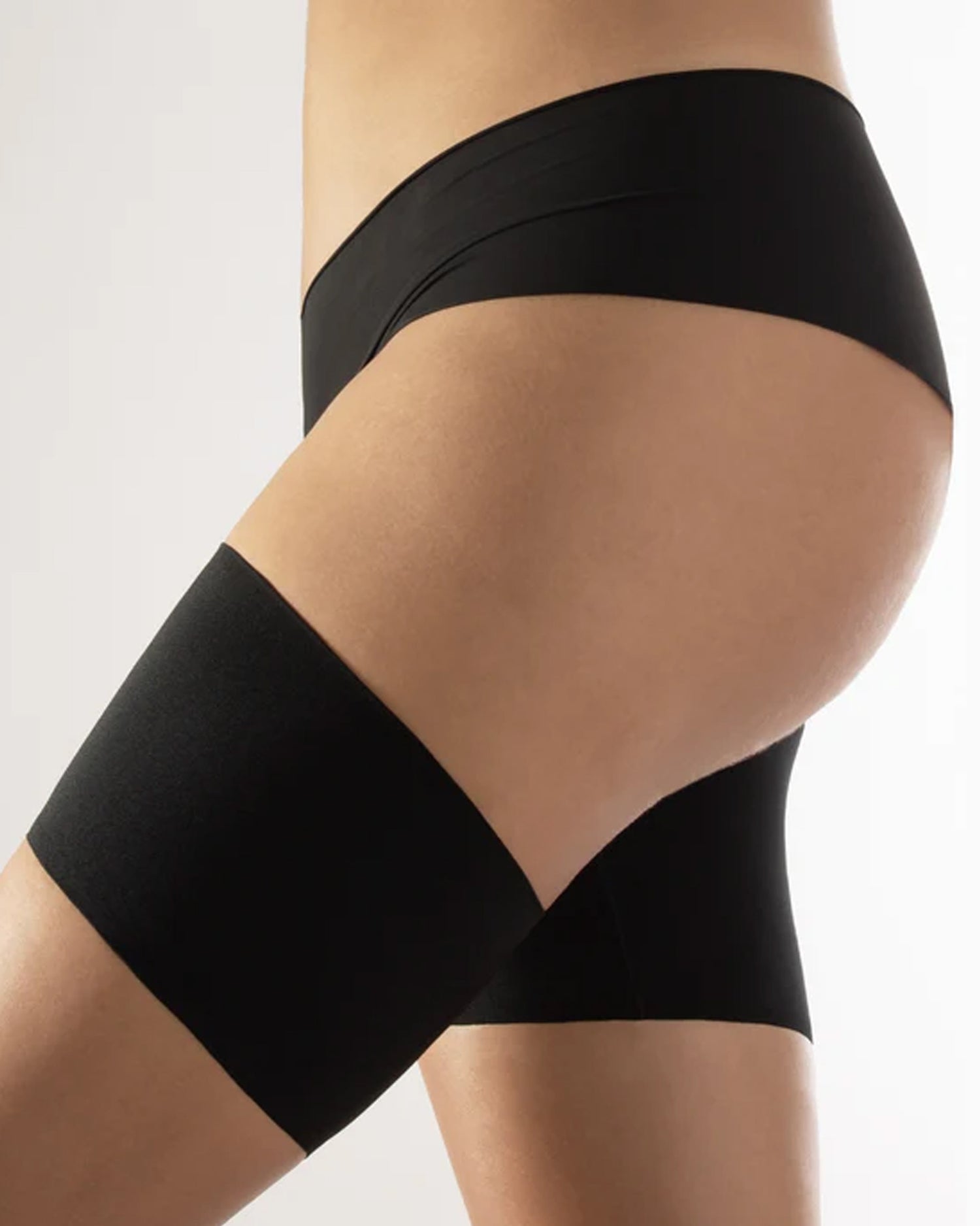 Plain black anti-chafing thigh bands to prevent thigh rubbing / "chub rub"