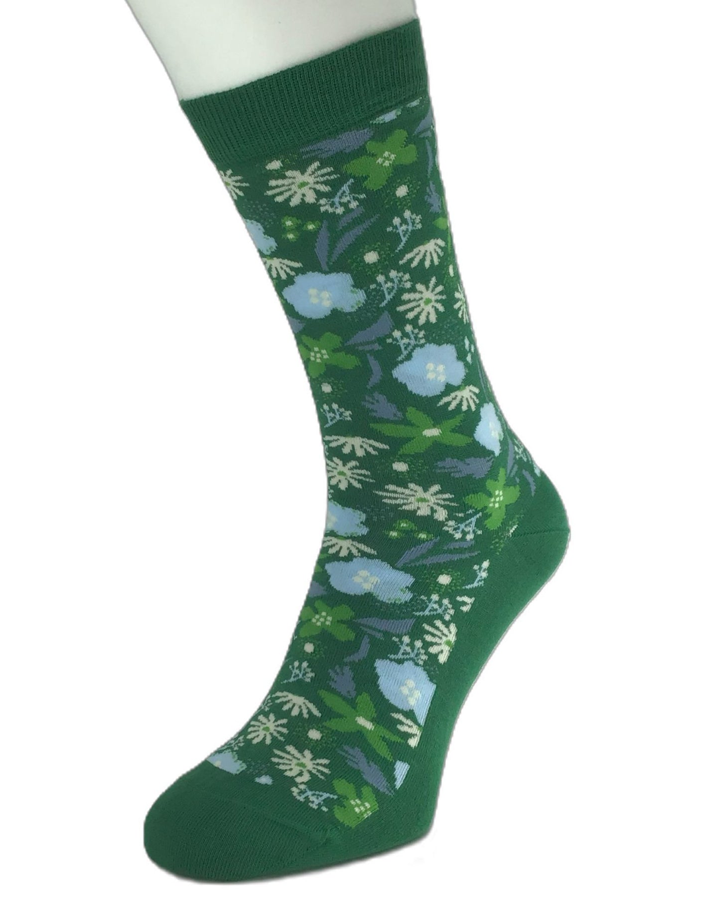 Green cotton socks with colourful floral patterned on a white background