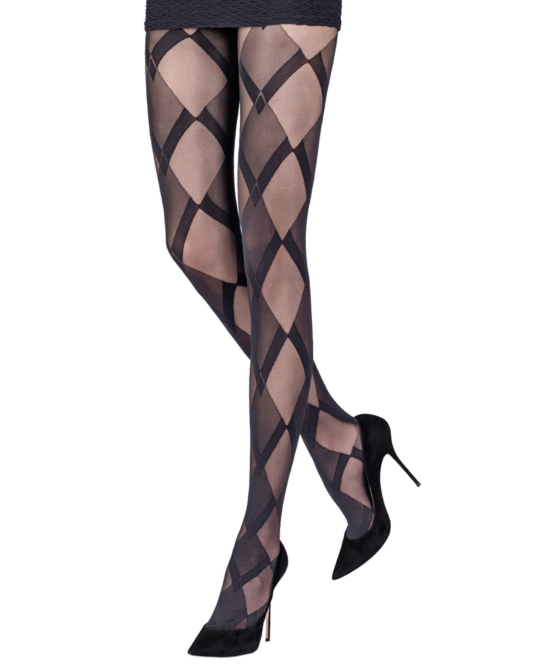 Sheer black fashion tights with an opaque and semi-opaque diamond style pattern, worn with black mini skirt and stilettos