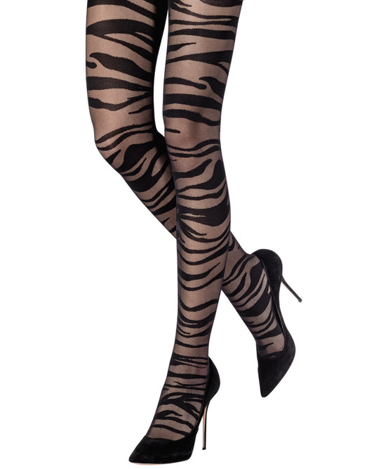 Black 
zebra patterned tights, worn with black high heels