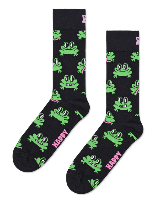 Black socks with green frog designs and 'Happy' text on a white background