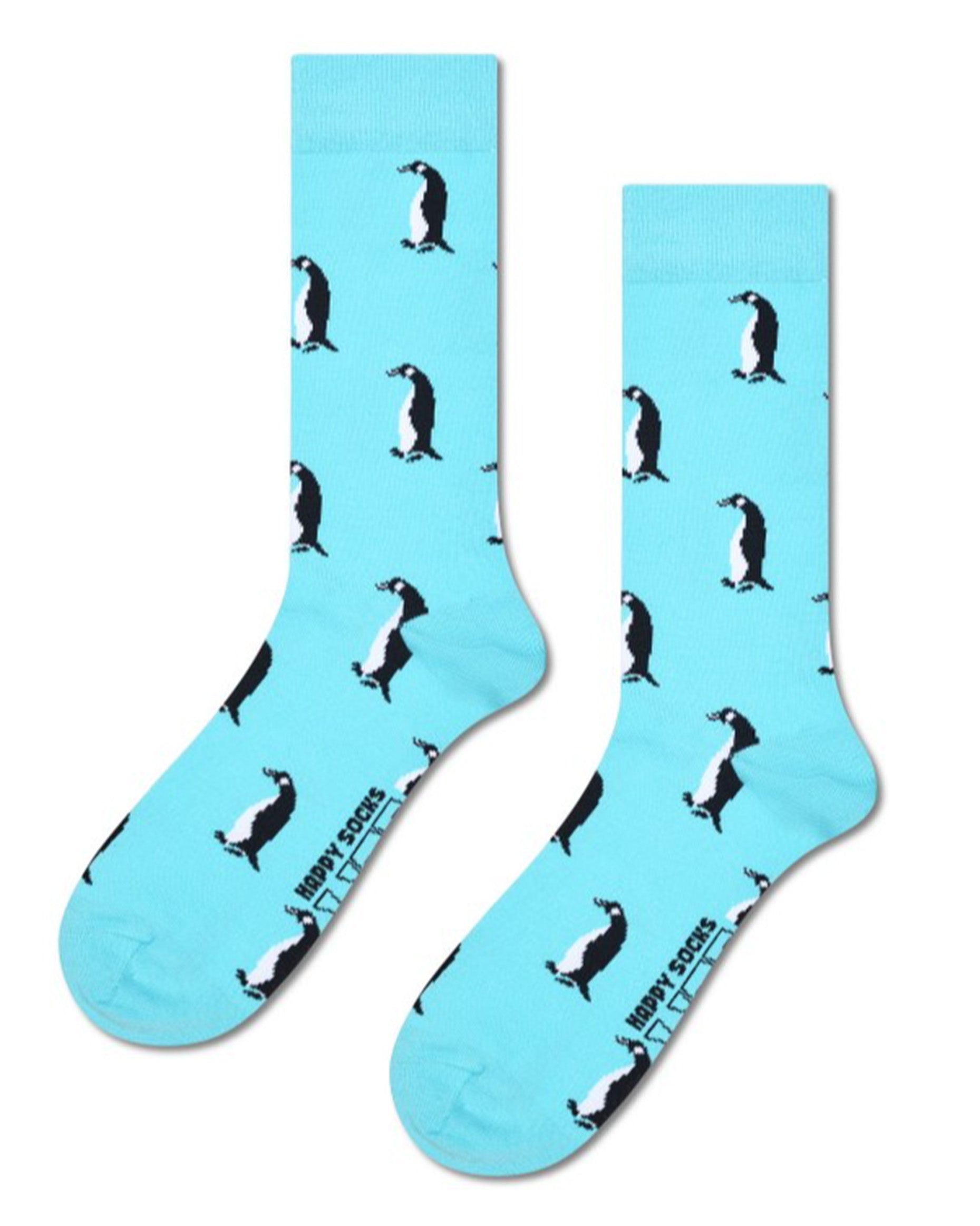 Bright turquoise blue cotton ankle socks with an all over black and white emperor penguin pattern.