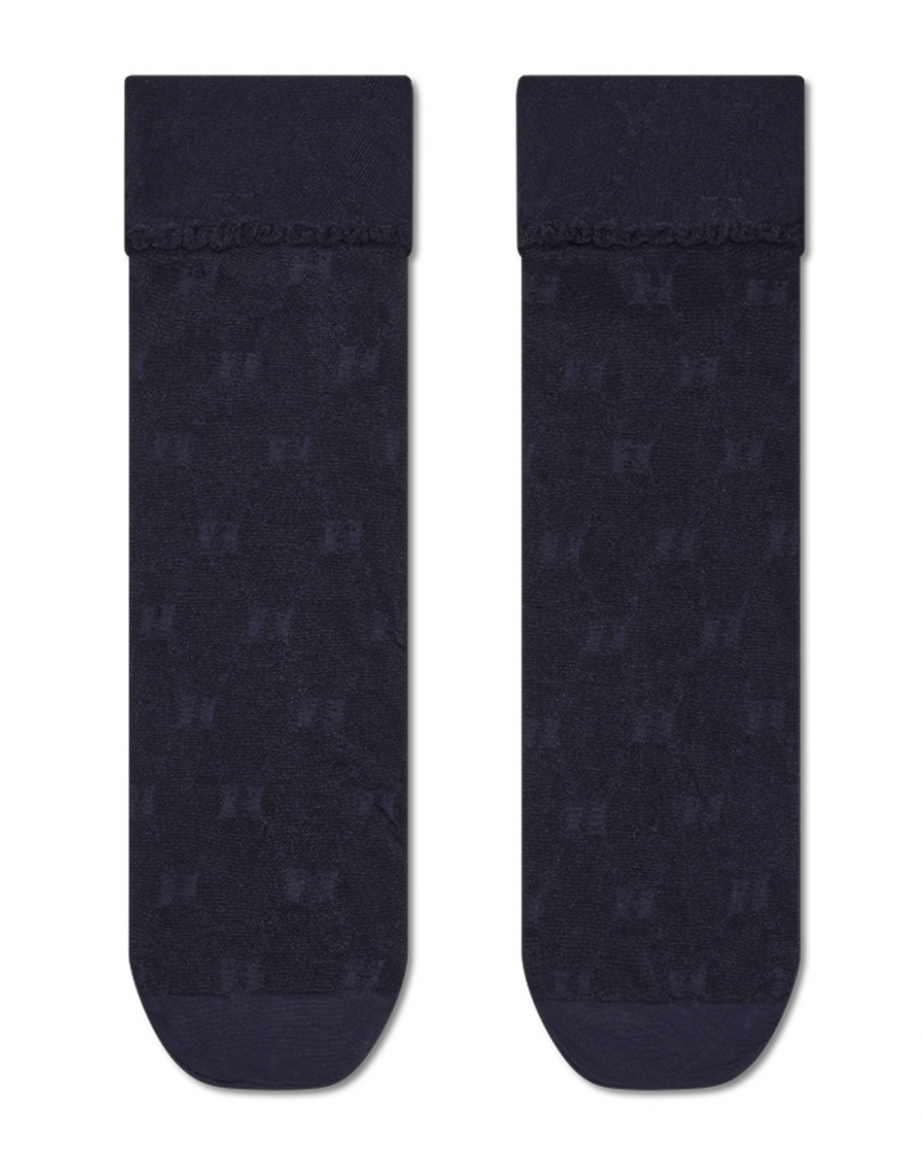 Two black socks with a subtle pattern on a white background