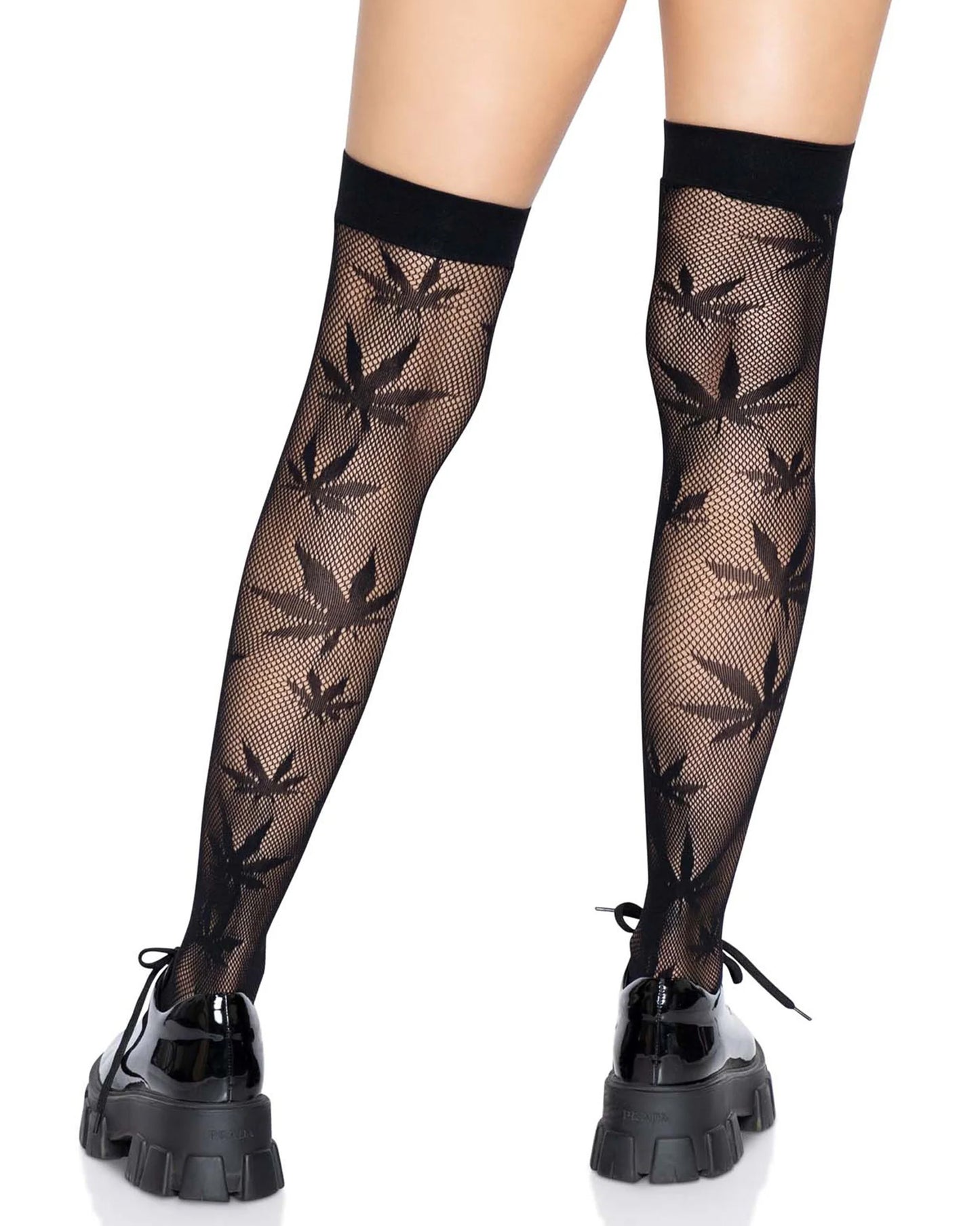 Leg Avenue 420 Thigh Highs - Black micro fishnet thigh high socks with an all over hash leaf pattern and deep elasticated cuff, worn with chunky patent leather loafers. Back view.