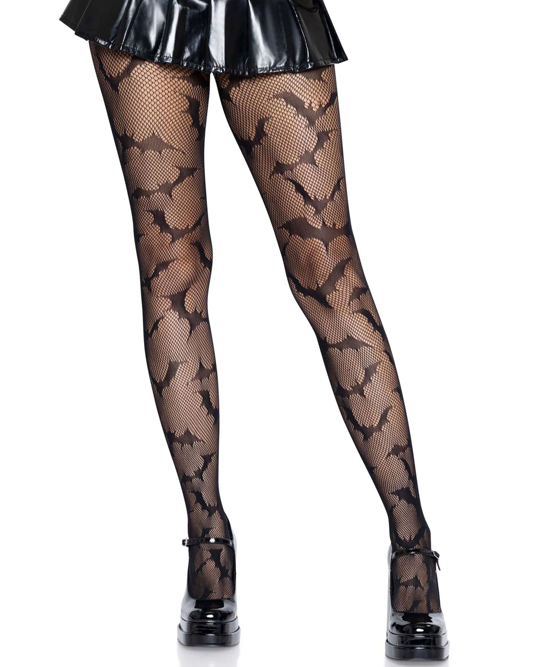 Black openwork fishnet tights with an all over flying bats pattern, seamless body and reinforced toes. Worn with faux leather skater skirt and mary jane shoes.