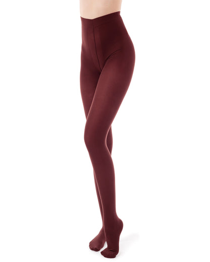 Burgundy tights worn by a person on a white background