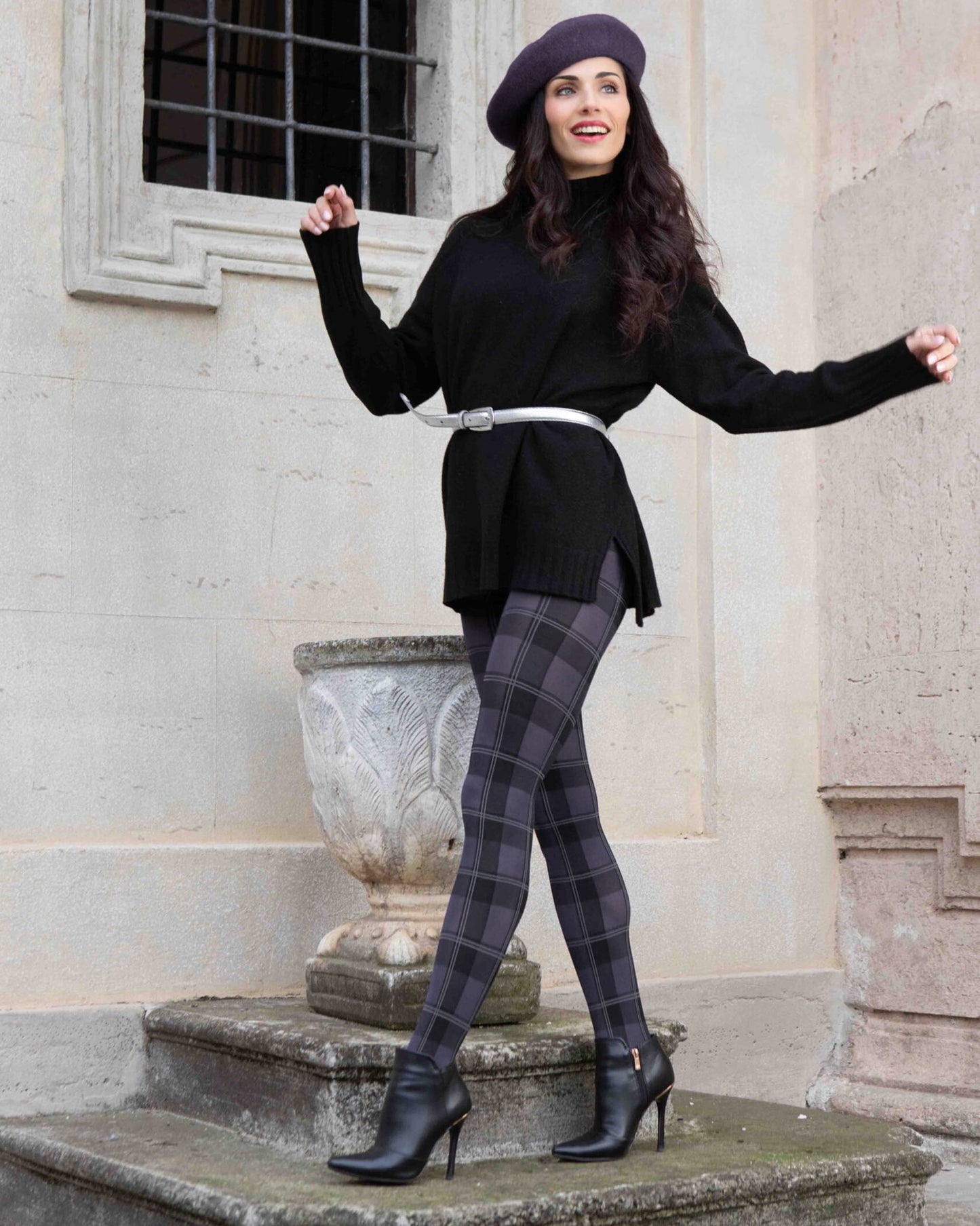 Omero Tartan 50 Collant - Grey opaque fashion tights with a black woven tartan style pattern, worn with high heel boots, short jumper dress, belt and beret.