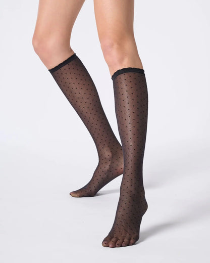 Sheer black tulle-effect knee-highs with micro polka dot pattern and narrow elasticated cuff with scalloped edge.