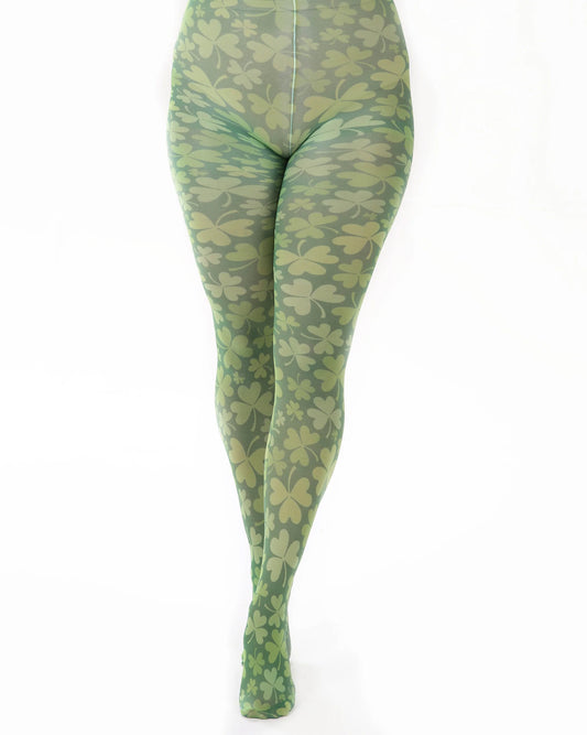 Green shamrock printed tights on a white background