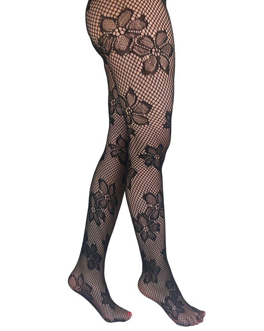 Pamela Mann Blossom Net Tights - Black openwork seamless fishnet tights with a floral design pattern. Side view.