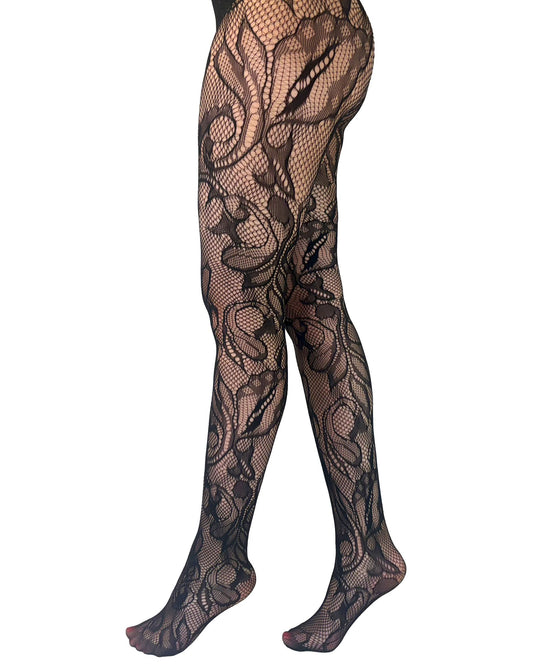 Pamela Mann Botanical Lace Tights - Black net design tights featuring an abstract leaf pattern that wraps around the leg and has reinforced toes, side view.