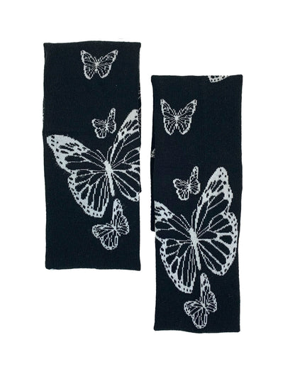 Soft cotton mix black knitted over-knee socks with white butterfly motif pattern that flutters up the leg and deep elasticated cuff. Folded flat.