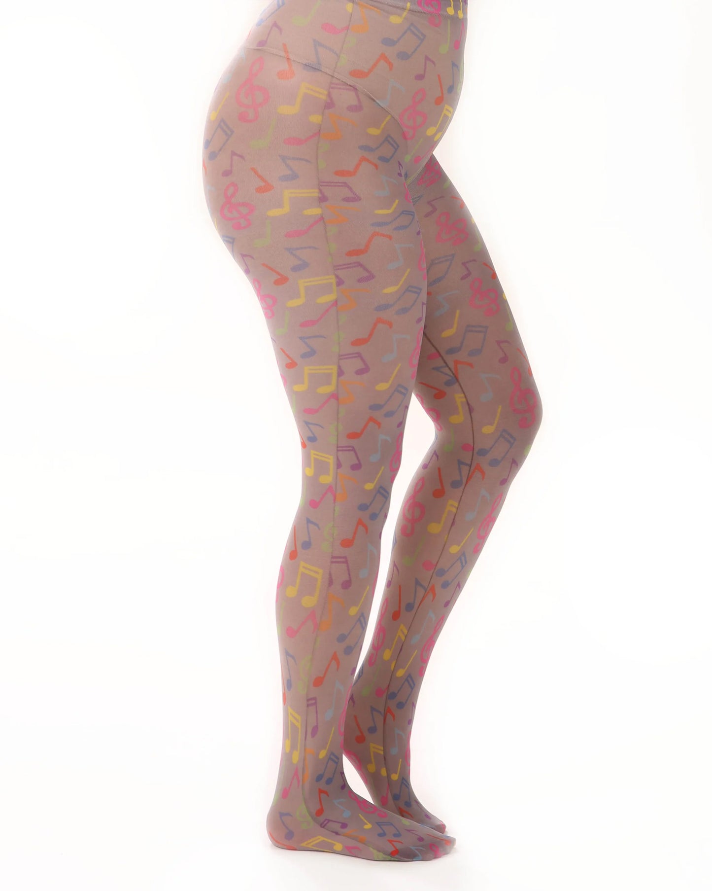 Pamela Mann Musical Notes Print Tights - Grey opaque tights with an all bright multicolured music notes print pattern. Side view.