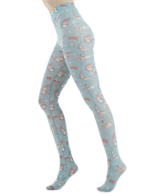 Pamela Mann Christmas Penguin Tights - Printed Christmas tights with a cute all over illustrated penguins, presents and stars print on a bright turquoise blue background.