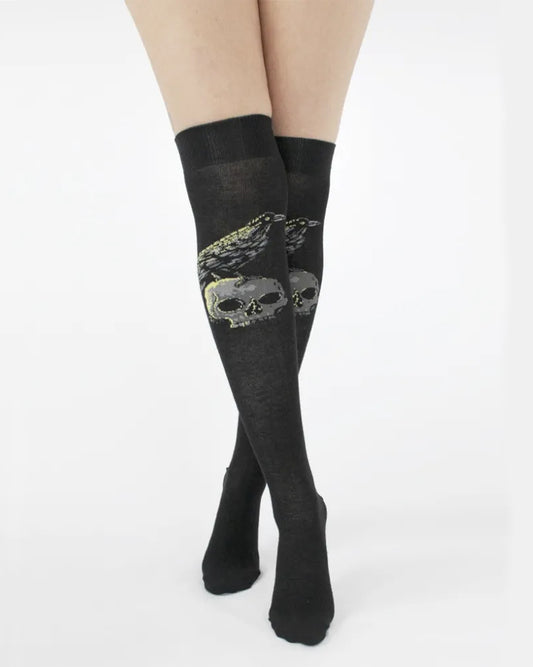 Pamela Mann Raven Skull Over The Knee Socks - Black cotton over the knee socks with a motif of a raven perched on top of a skull in grey and pale green and a deep elasticated cuff.