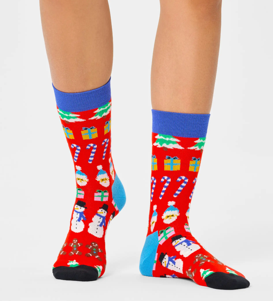 Happy Sock All I Want For Christmas Sock - Red crew length Christmas themed ankle socks with a fairisle style pattern of stripes of candy canes, Santas, presents, snow men, ginger bread men.