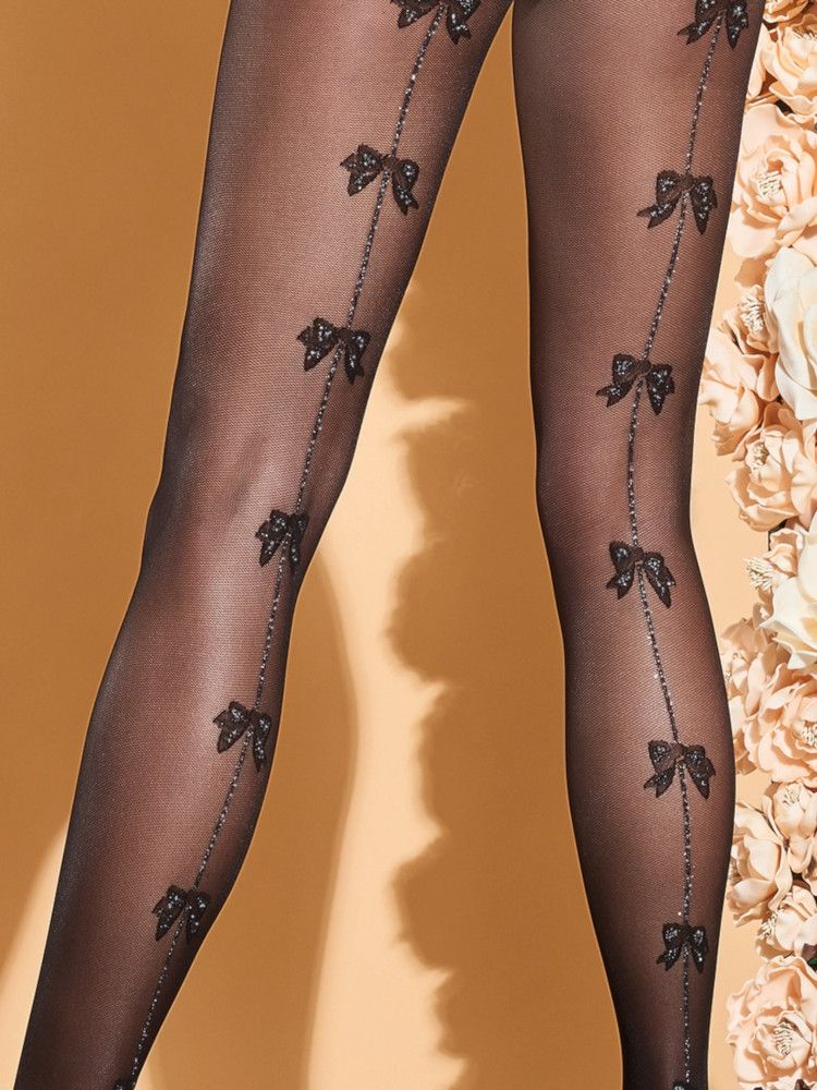 Trasparenze Kiwano Tights - Sheer micro mesh seamed tights with a sparkly sliver back seam with little bow detail dotted up along it and an elegant striped panty brief top with a floral trim and bow.