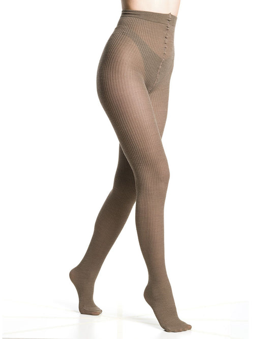Light brown/beige ribbed knitted tights worn by a person on a white background