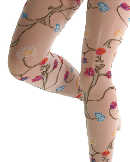 Ivory coloured tights with a colourful floral patterned (close up detail) on a white background